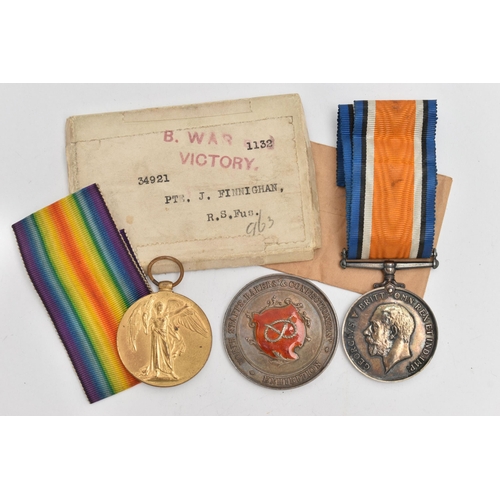 121 - TWO WORLD WAR ONE MEDALS AND A SILVER MEDALLION, to include a WWI medal fitted with a ribbon, assign... 