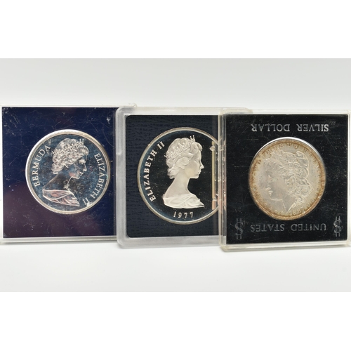 123 - THREE CASED COINS, to include a 1977 Elizabeth II Turkes and Caicos Island 20 Crowns coin, a United ... 