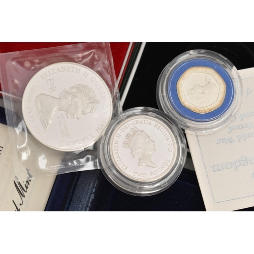 128 - THREE CASED COINS, to include a 'United Kingdom Proof Silver Piedfort Twenty-Pence 1982' with COA, a... 