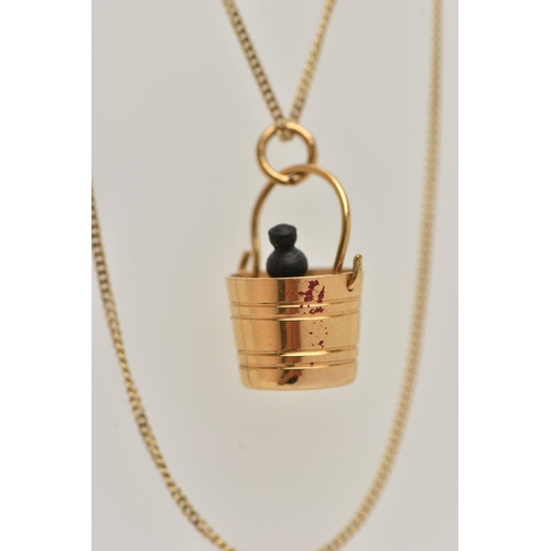 15 - A 9CT GOLD PENDANT AND CHAIN, the pendant in the form of a champagne bucket with a plastic champagne... 