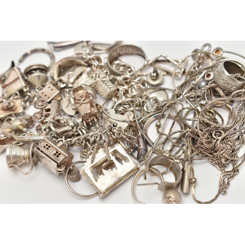 39 - A SELECTION OF SILVER AND WHITE METAL JEWELLERY, to include a charm bracelet suspending 21 charms wi... 