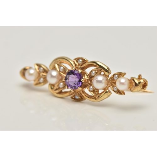 76 - A 9CT GOLD AMETHYST AND SEED PEARL BROOCH, open work brooch set with a central circular cut amethyst... 