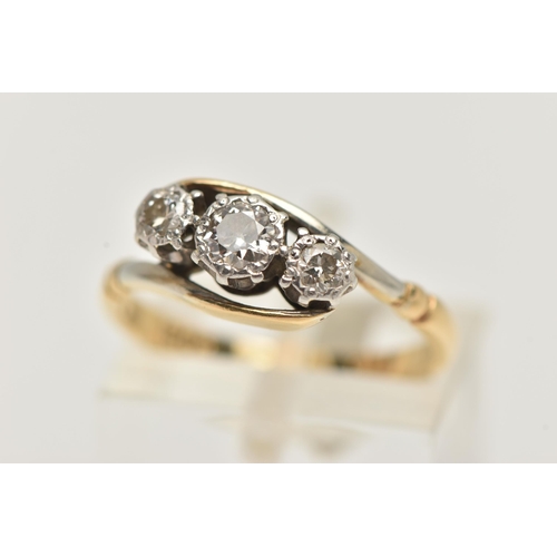 82 - A THREE STONE DIAMOND RING, three round brilliant cut diamonds, prong set in white metal, leading on... 