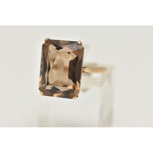 83 - A 9CT GOLD DRESS RING, rectangular cut smoky quartz, prong set in yellow gold, hallmarked 9ct Edinbu... 