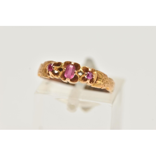 84 - A GEM SET RING, an oval cut pink paste stone with two round cut spinels, prong set in yellow metal, ... 