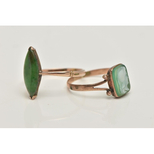 85 - TWO GEM SET RINGS, the first a navette cabochon green hardstone, set in rose metal, stamps indisting... 