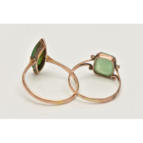 85 - TWO GEM SET RINGS, the first a navette cabochon green hardstone, set in rose metal, stamps indisting... 