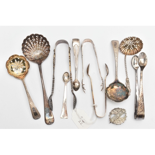 154 - A SMALL PARCEL OF LATE VICTORIAN TO GEORGE V ASSORTED SUGAR TONGS, SIFTER SPOONS, ETC, comprising fi... 