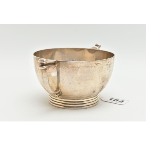 164 - A GEORGE VI SILVER TWIN HANDLED PORRIDGE BOWL, with angular handles and ribbed foot, makers James Di... 