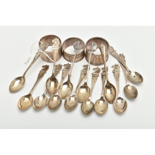 166 - A PARCEL OF SILVER GOLFING TEASPOONS AND THREE ELIZABETH II CIRCULAR SILVER NAPKIN RINGS, the teaspo... 