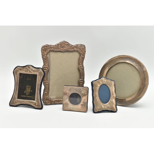 168 - FIVE ASSORTED 20TH CENTURY SILVER MOUNTED EASEL BACK PHOTOGRAPH FRAMES, the largest a Britannia stan... 