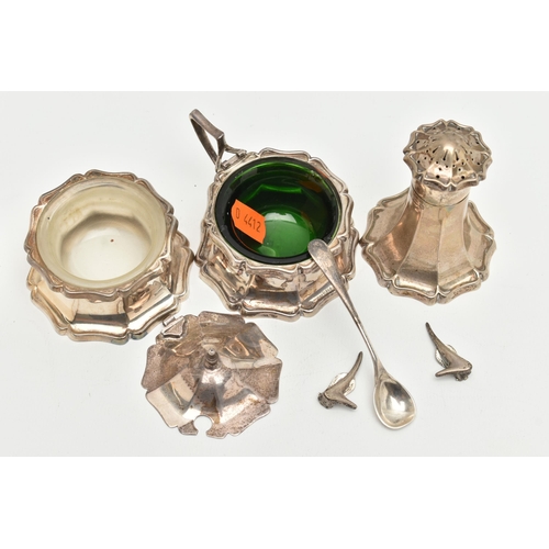 171 - A THREE PIECE SILVER CONDIMENT SET, comprising of a mustard with green glass insert and broken cover... 