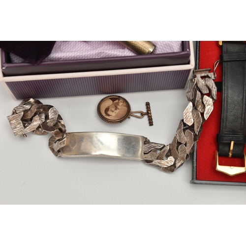 189 - A BOX OF ASSORTED ITEMS, to include a heavy silver identification bracelet, polished tag fitted with... 