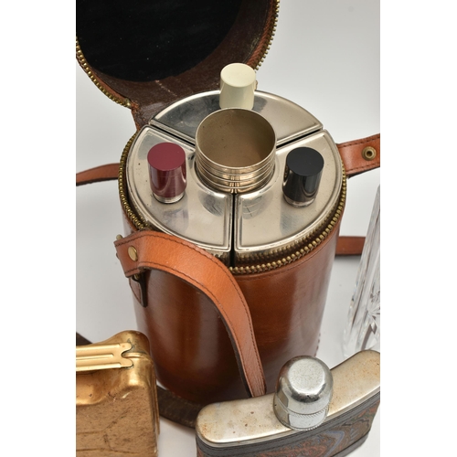 216 - A BOX OF HIP FLASKS, ETC, comprising a tan leather zipped cylindrical case containing three curved h... 