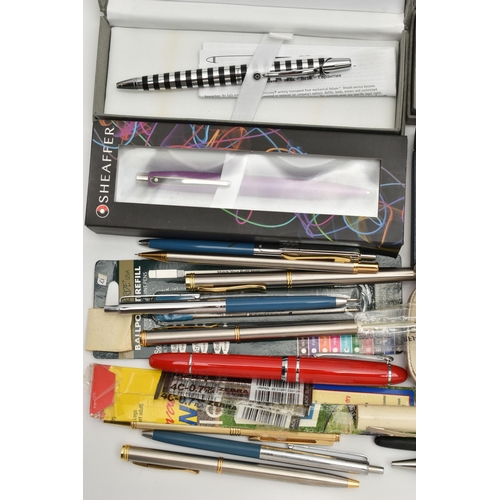 217 - A BOX OF ASSORTED PENS, to include a boxed 'Sheaffer' propelling pencil, a boxed 'Parker' ball point... 