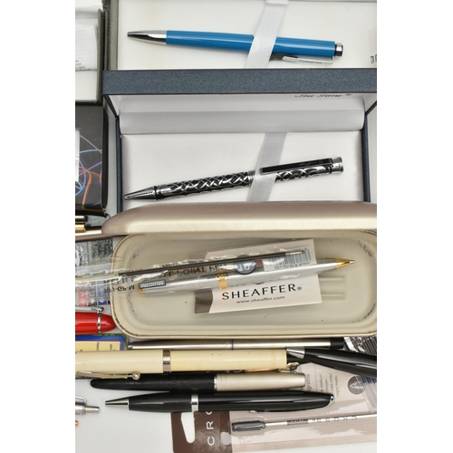 217 - A BOX OF ASSORTED PENS, to include a boxed 'Sheaffer' propelling pencil, a boxed 'Parker' ball point... 