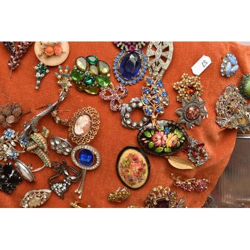 222 - A BOX OF COSTUME JEWELLERY, to include an orange cushion pinned with various brooches, together with... 