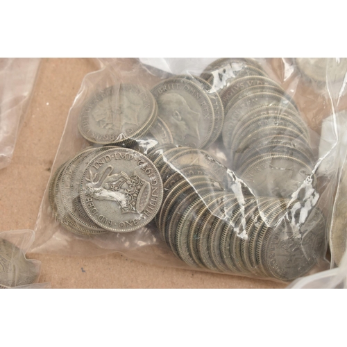 243 - A CARDBOARD TRAY CONTAINING 20th CENTURY COINAGE, to include over 2 Kilos of .500 Silver with high g... 