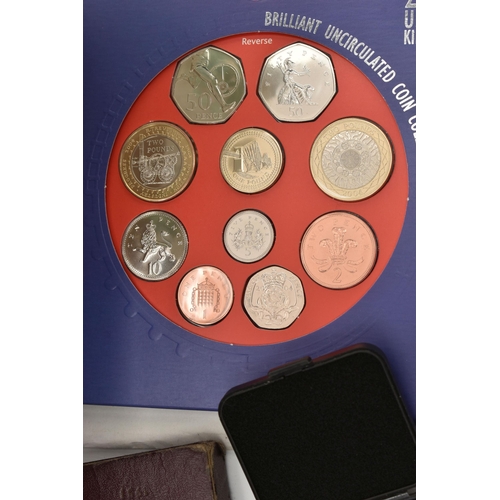 246 - A CARDBOARD BOX  OF MIXED COINAGE, to include a 2011 complete set of Fifty Pence coins for the 2012 ... 