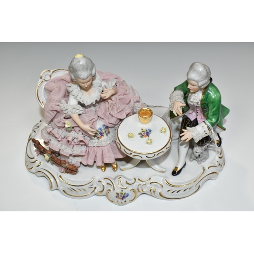 379 - A SANDIZELL PORCELAIN FIGURAL GROUP, mid-century lace detail figure of a young couple playing dice, ... 