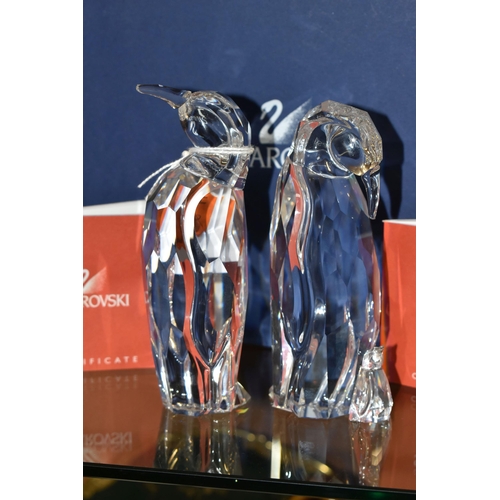 390 - TWO BOXED SWAROVSKI CRYSTAL 'SYMBOLS' COLLECTION PENGUIN FIGURES, comprising Symbols - Penguin Mothe... 