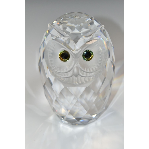 399 - A BOXED SWAROVSKI CRYSTAL GIANT OWL SCULPTURE, with coloured eyes and frosted face, model no 010125,... 