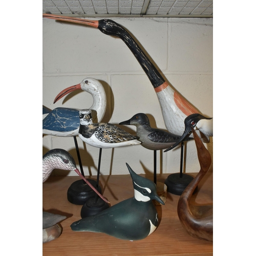 414 - A COLLECTION OF WOODEN AND CERAMIC SHORE BIRDS, including a Helmsdale Pottery Lapwing, a mid-twentie... 