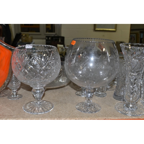 434 - A QUANTITY OF GLASSWARE, comprising three decanters, a set of six cut glass wine glasses, a small de... 