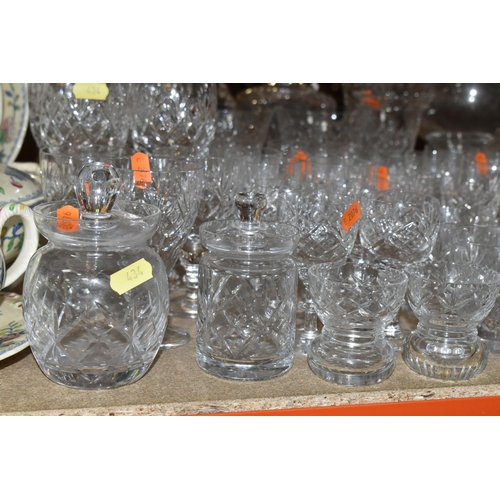 434 - A QUANTITY OF GLASSWARE, comprising three decanters, a set of six cut glass wine glasses, a small de... 