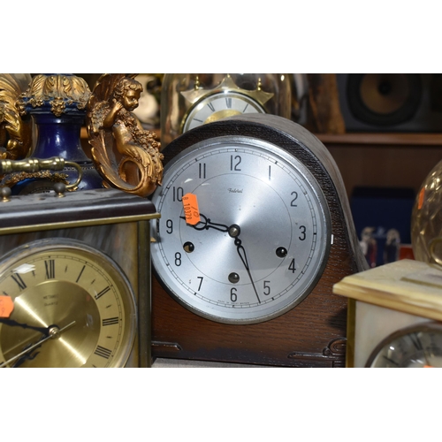 443 - A GROUP OF TEN MANTEL CLOCKS, comprising a mid- century USSR Vesna mantel clock, an oak cased clock,... 