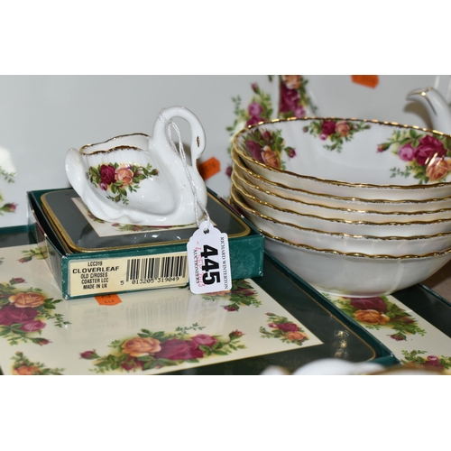 445 - A GROUP OF ROYAL ALBERT 'OLD COUNTRY ROSES' PATTERN TEA AND DINNERWARE, comprising celebration cake ... 