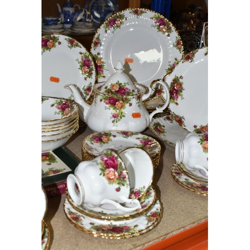 445 - A GROUP OF ROYAL ALBERT 'OLD COUNTRY ROSES' PATTERN TEA AND DINNERWARE, comprising celebration cake ... 