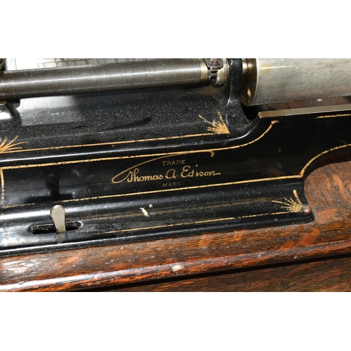 454 - AN EARLY 20TH CENTURY THOMAS EDISON PHONOGRAPH, serial number H322216, with a black painted papier m... 
