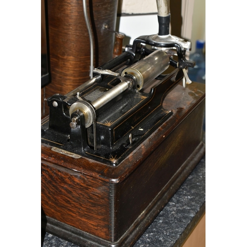 454 - AN EARLY 20TH CENTURY THOMAS EDISON PHONOGRAPH, serial number H322216, with a black painted papier m... 