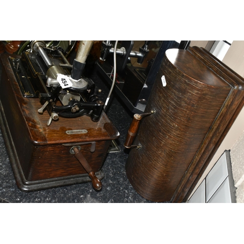 454 - AN EARLY 20TH CENTURY THOMAS EDISON PHONOGRAPH, serial number H322216, with a black painted papier m... 
