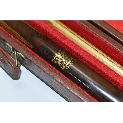 463 - A CASED POWER GLIDE ARENA EMBASSY WORLD SNOOKER TWO PIECE CUE, complete and in good condition with o... 