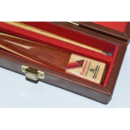 463 - A CASED POWER GLIDE ARENA EMBASSY WORLD SNOOKER TWO PIECE CUE, complete and in good condition with o... 