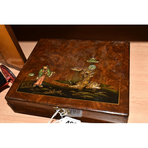 466 - A GROUP OF CLOCKS AND ORIENTAL ORNAMENTS, comprising a games box decorated with a Japanese garden sc... 