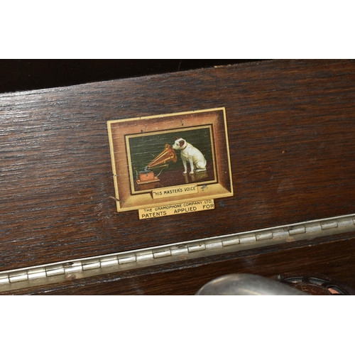 471 - AN EARLY 20TH CENTURY OAK CASED HMV MODEL 109 TABLE TOP GRAMOPHONE, with winding handle, an HMV need... 