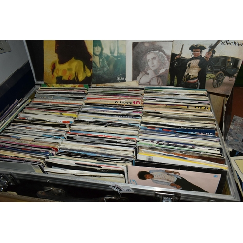 487 - AN ALUMINIUM TRAVEL CASE CONTAINING OVER FOUR HUNDRED  SINGLE RECORDS, artists include Bow Wow Wow, ... 