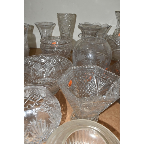 499 - TWENTY ONE CUT CRYSTAL VASES AND FRUIT BOWLS, comprising a pedestal fruit dish, Royal Doulton fruit ... 