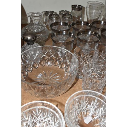 505 - A LARGE QUANTITY OF CUT CRYSTAL AND GLASSWARE, comprising a Royal Doulton decanter (chipped stopper)... 