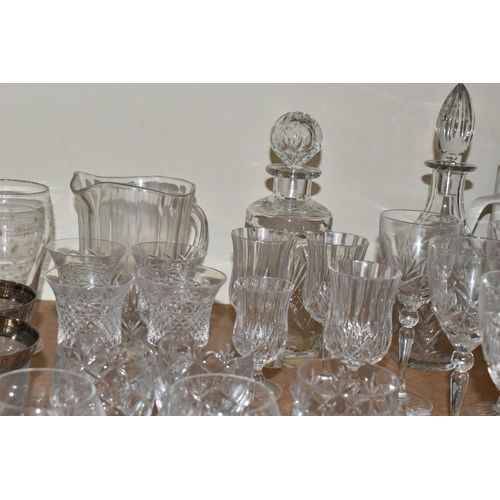 505 - A LARGE QUANTITY OF CUT CRYSTAL AND GLASSWARE, comprising a Royal Doulton decanter (chipped stopper)... 