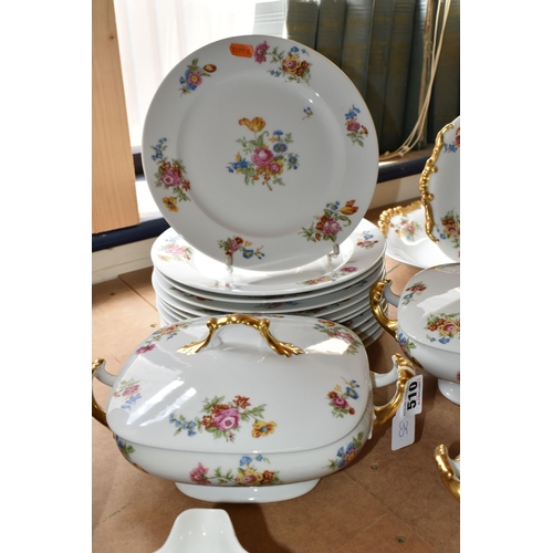 510 - LIMOGES DINNER SET, transfer print floral design on a white ground, gold gilt handles, comprising tw... 