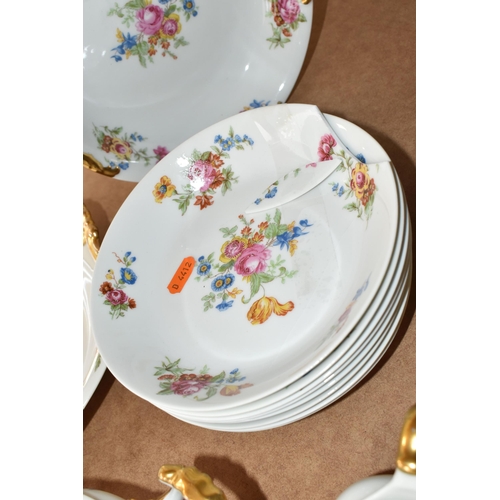 510 - LIMOGES DINNER SET, transfer print floral design on a white ground, gold gilt handles, comprising tw... 