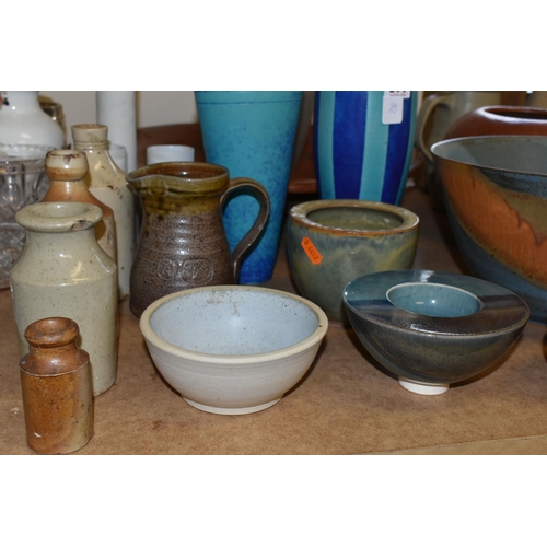 511 - A LARGE COLLECTION OF STUDIO POTTERY, twenty nine pieces comprising large chargers, bowls, vases and... 