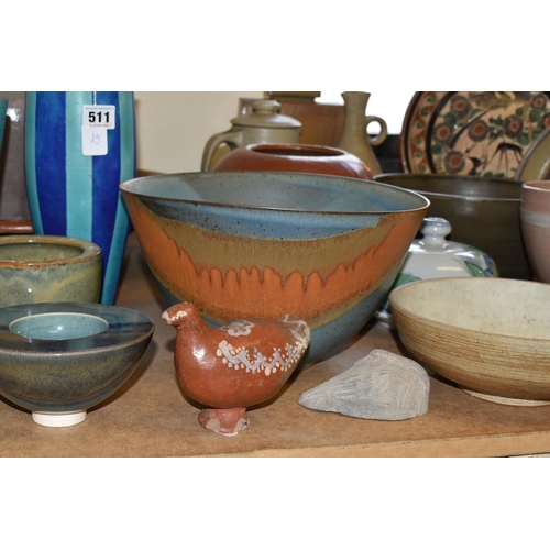 511 - A LARGE COLLECTION OF STUDIO POTTERY, twenty nine pieces comprising large chargers, bowls, vases and... 