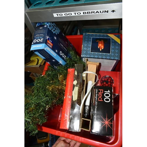 562 - A COLLECTION OF CHRISTMAS ITEMS, to include four boxed trees, boxed and unboxed tree decorations, Na... 