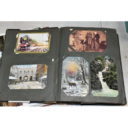 608 - TWO ALBUMS OF POSTCARDS containing approximately 428 miscellaneous examples from the Edwardian era t... 