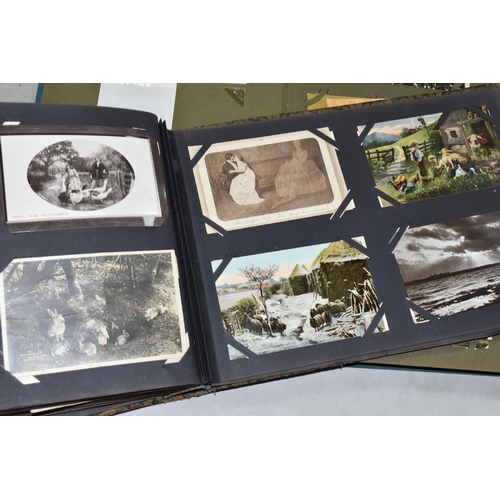 616 - TWO ALBUMS OF POSTCARDS containing approximately 566 early 20th century postcards (Edwardian-1930's ... 